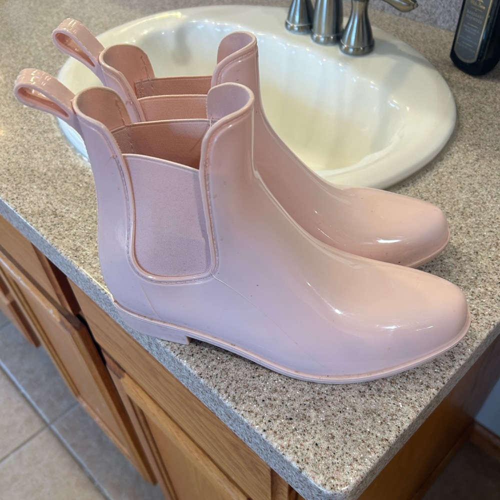 Pink rain boots